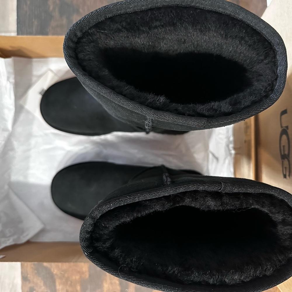 New in Box Tall Black Uggs.